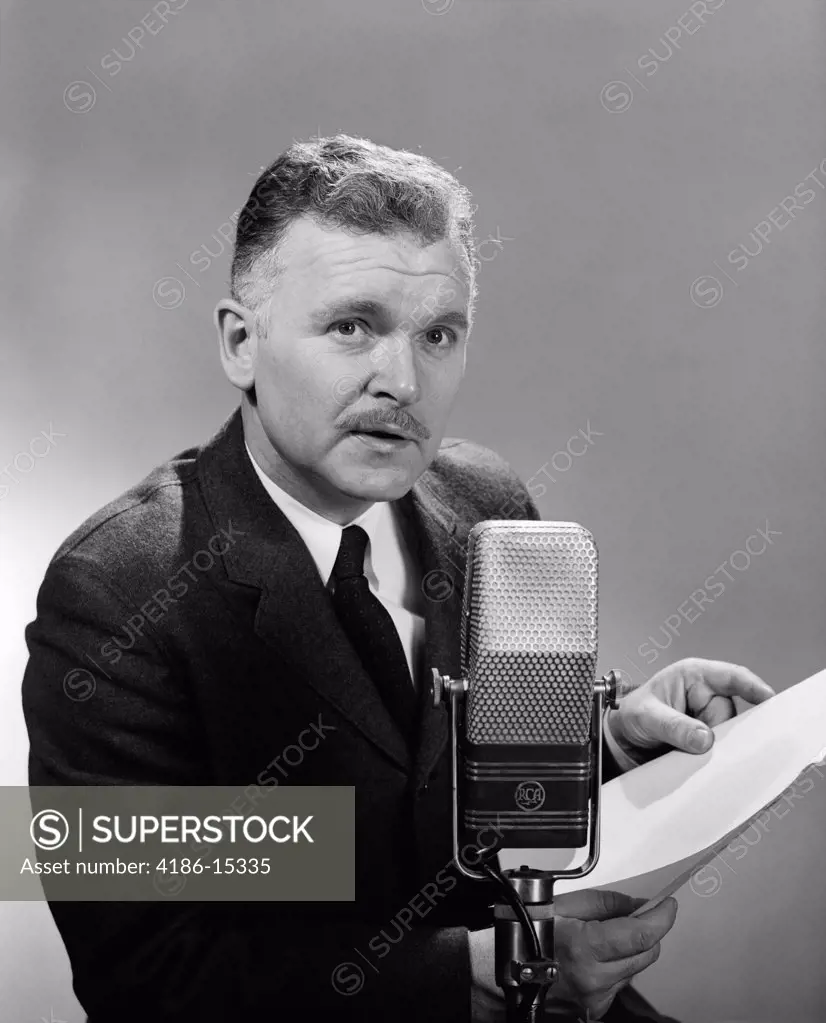 1950S Man Reading At Microphone Radio Broadcast Indoor