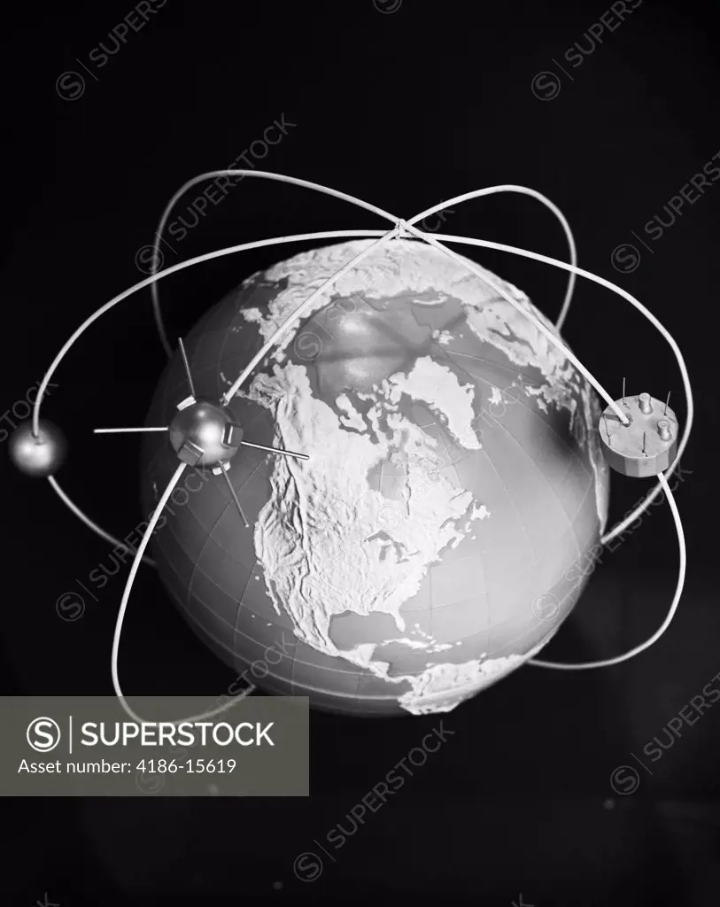 1960S Model Of Earth With Three Satellites In Orbit