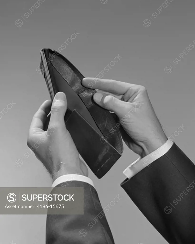 1960S Male Hands Opening An Empty Wallet