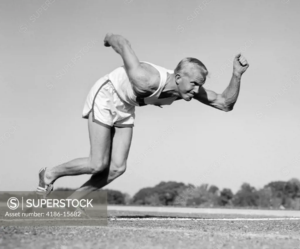 1960S Runner Coming Out Of Starting Position