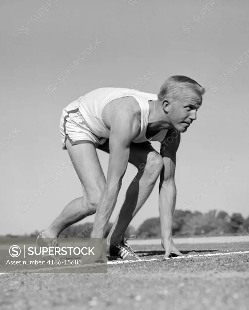 1960S Man Sprinter Runner At The Starting Line For Foot Race Outdoor