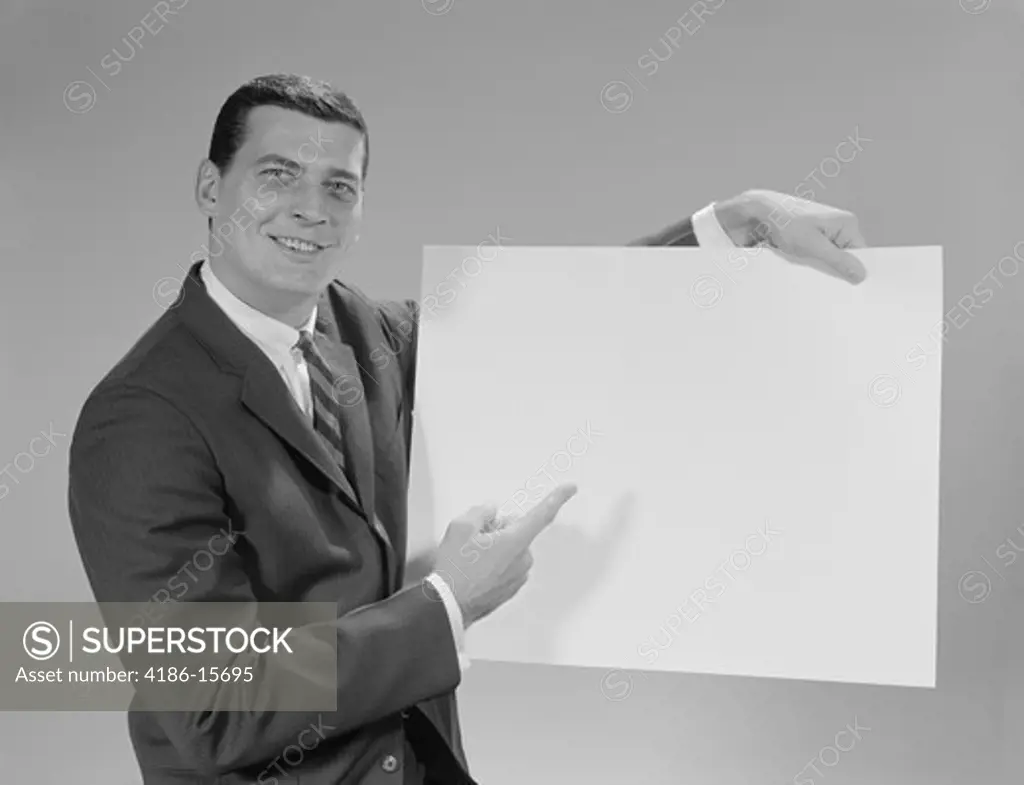1960S Smiling Man Pointing To Blank Poster