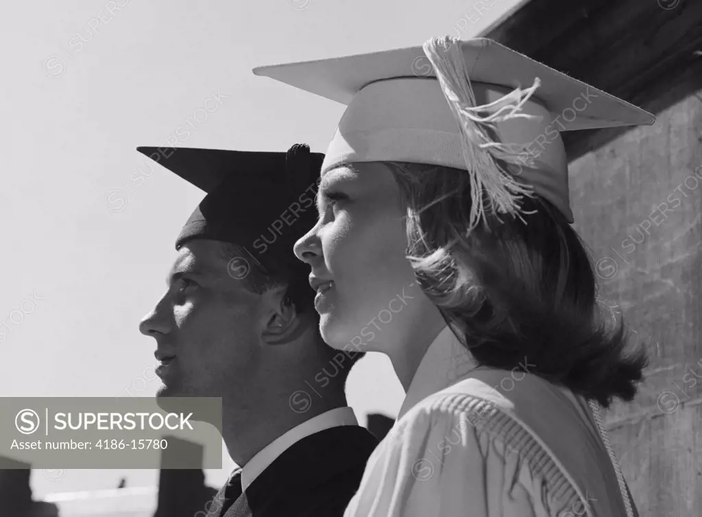 1960S Profile Portrait Male And Female Graduate Wearing Cap And Gown
