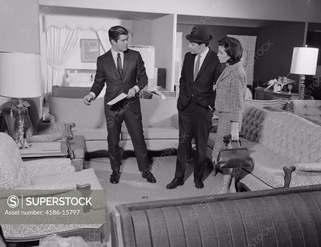 1960S Furniture Store Salesman Talking To Couple