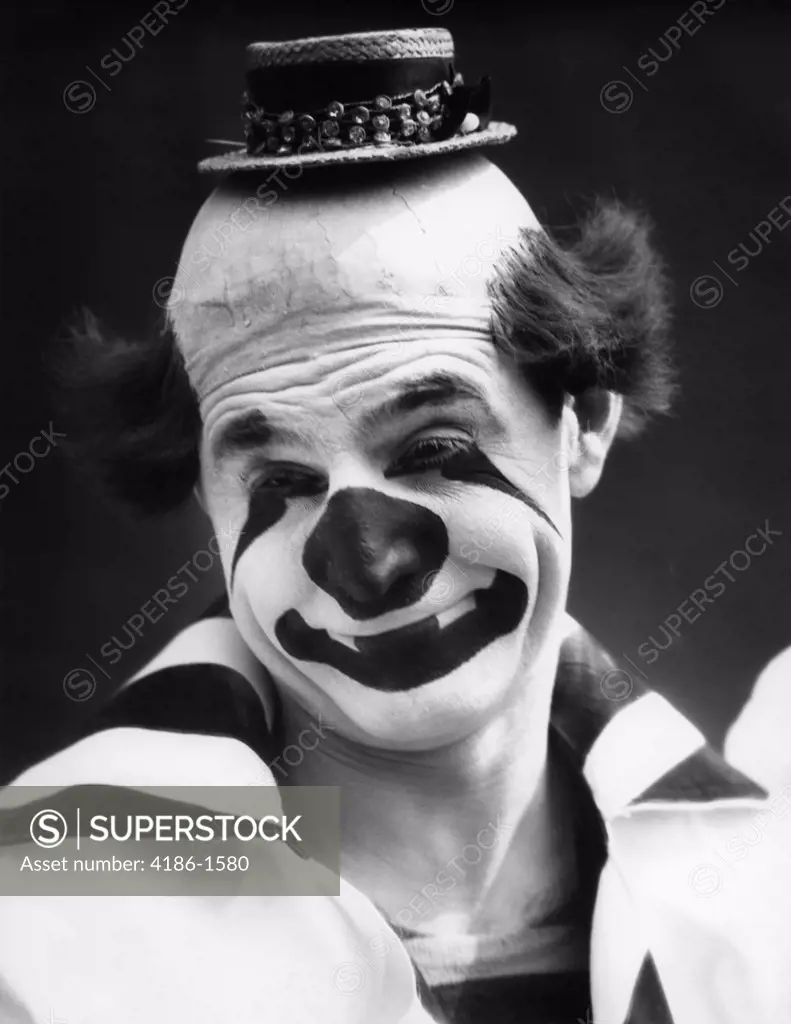 1930S Clown In Classic Whiteface With A Happy Sad Face With A Bald Head Wearing A Tiny Straw Hat