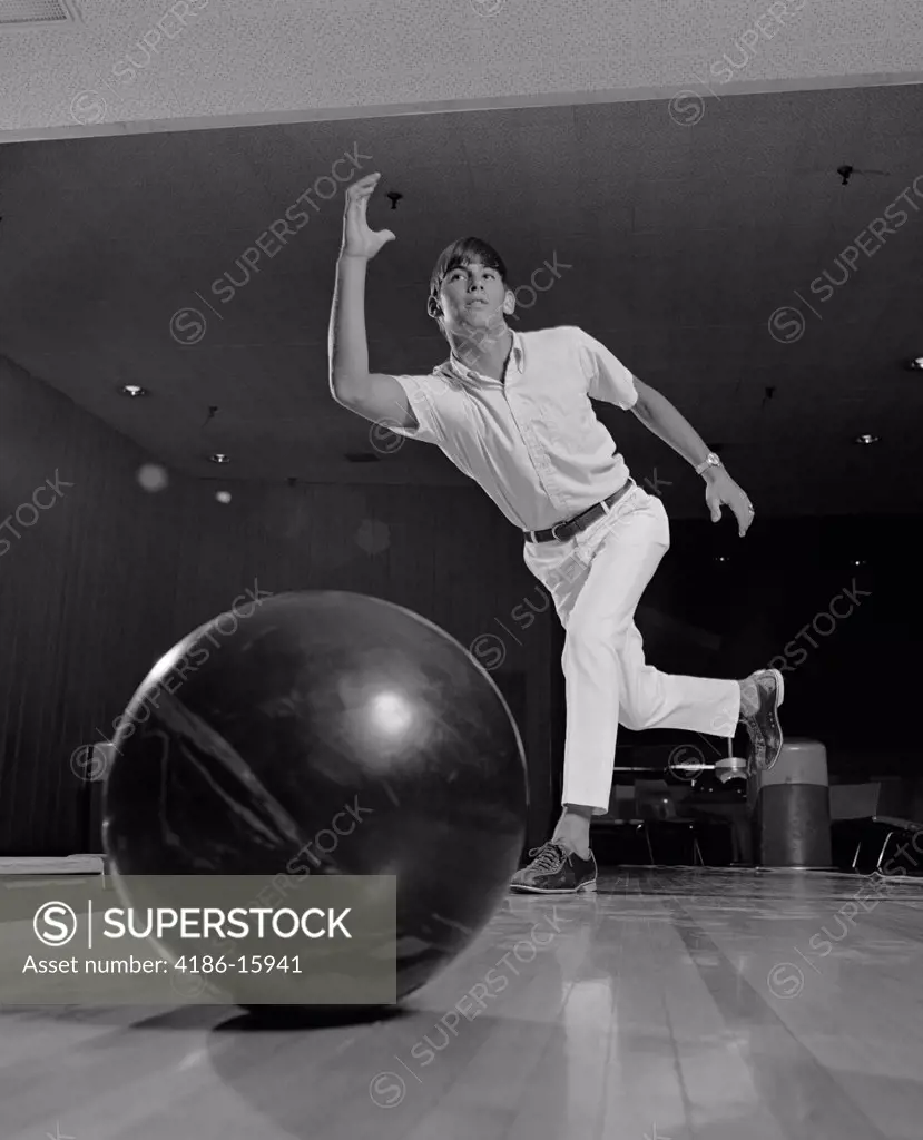 1970S Young Man Having Just Thrown A Bowling Ball