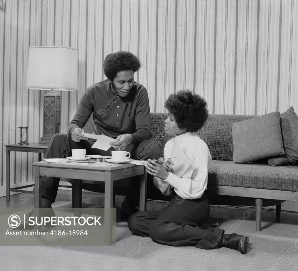 1970S African American Couple Living Room Talking Over Coffee 