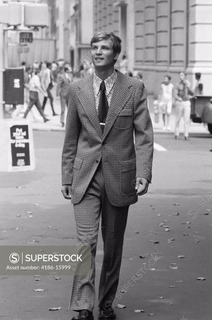 1970S Businessman In Suit Walking Down City Street