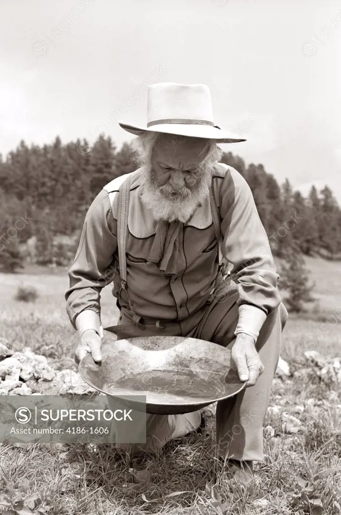 1950S Male Prospector Panning For Gold