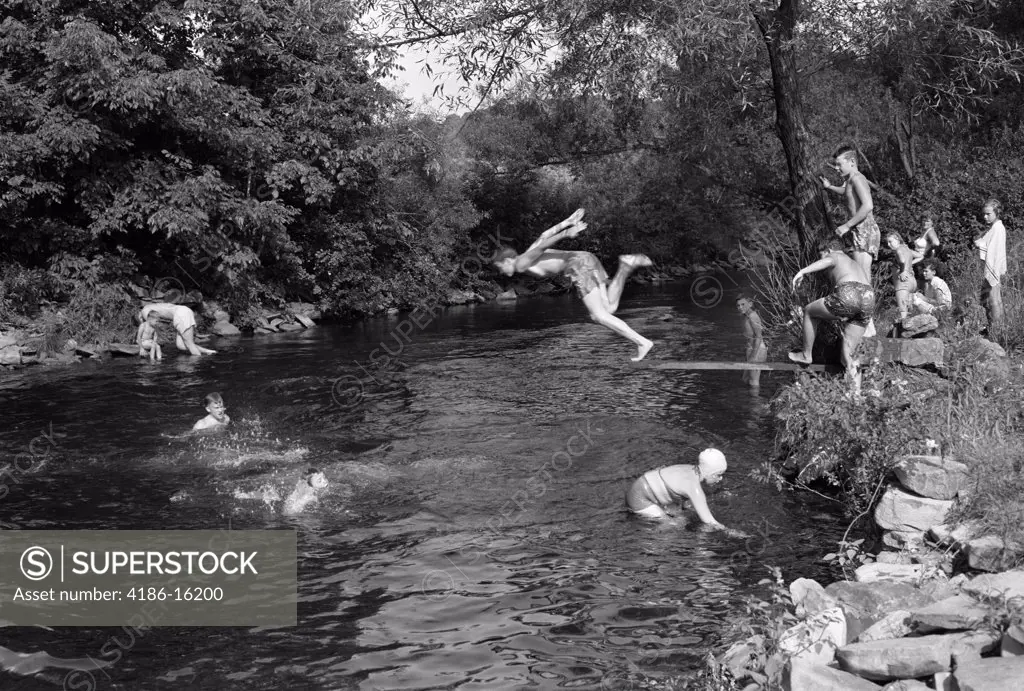 1950S Boys Girls Group Swimming In Creek Stream Pond Summer Fun Jump Splash Dive Retro Vintage Swim Swimming Hole