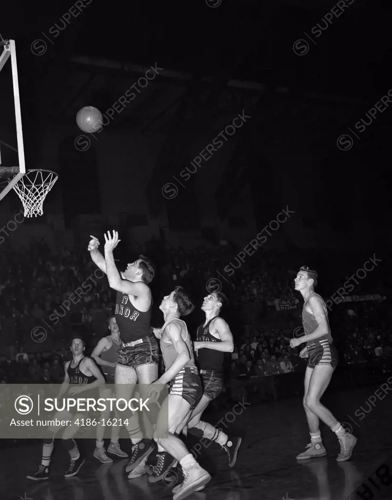 1940S 1950S Basketball Game Indoors Basketball Just Thrown About To Go In Basket