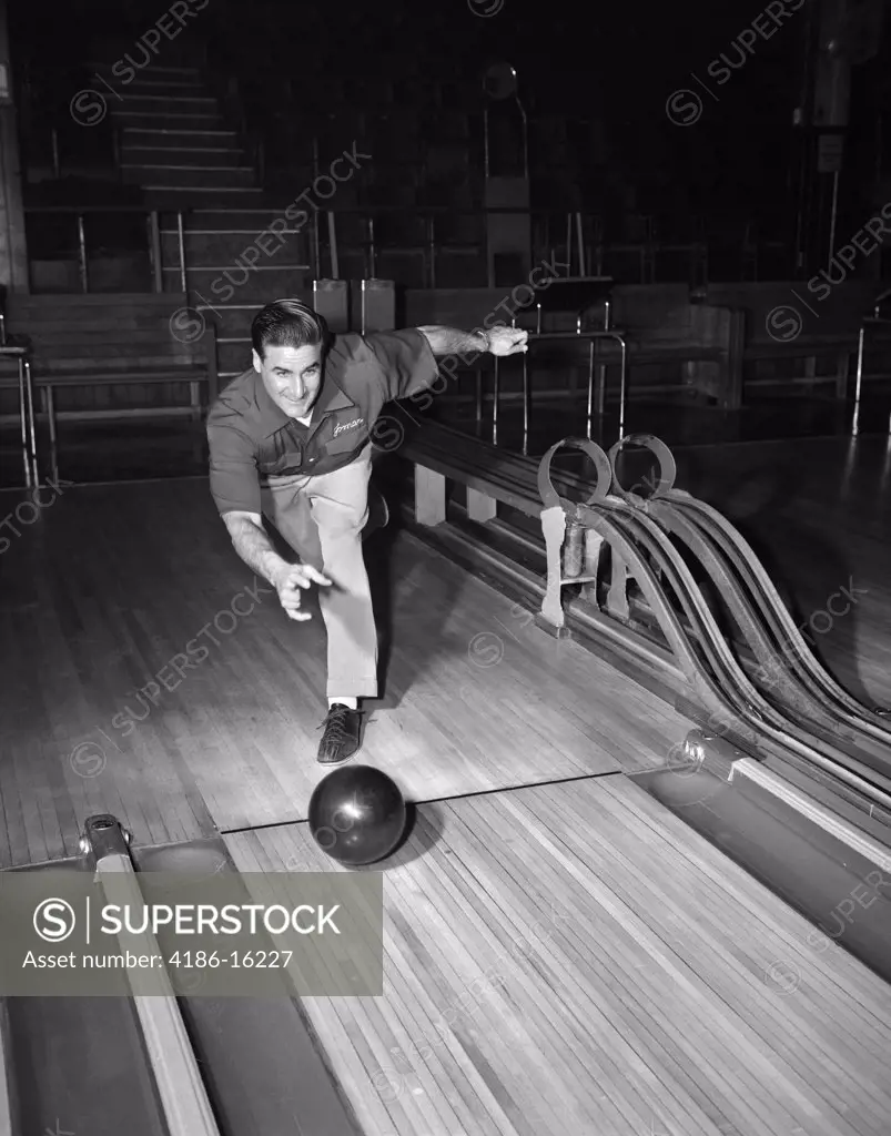 1940S 1950S Man Throwing Bowling Ball Down Alley