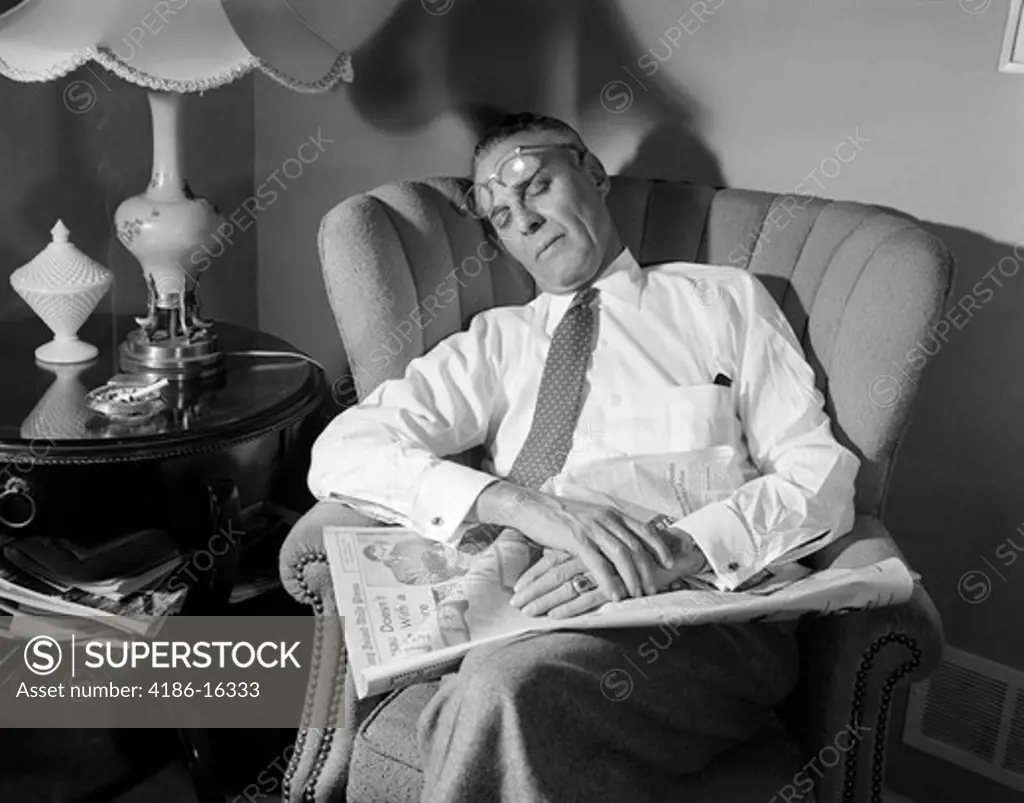 1940S Man Fell Asleep While Reading Newspaper In Chair Glasses On Forehead