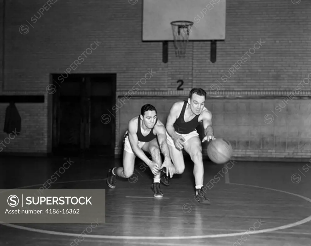 1930S Two Boys Playing Basketball Inside Court Dribbling Basketball