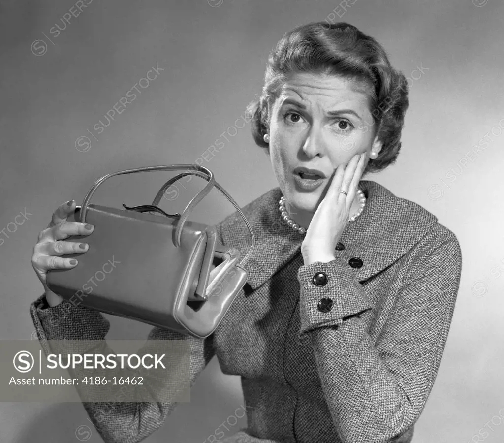 1950S Woman Funny Surprised Oh No Facial Expression Hand Cheek Look Empty Hand Bag Pocketbook Broke