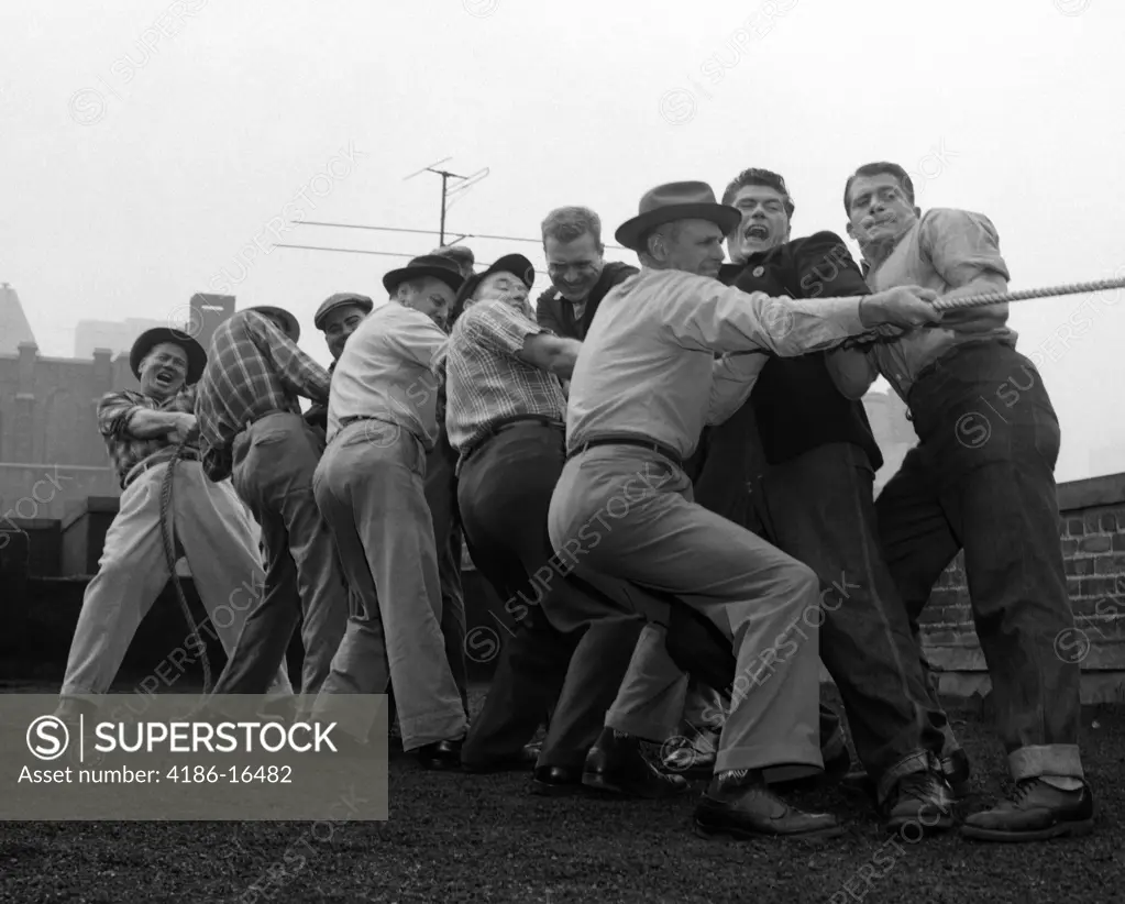 1950S Men Playing Tug-Of-War