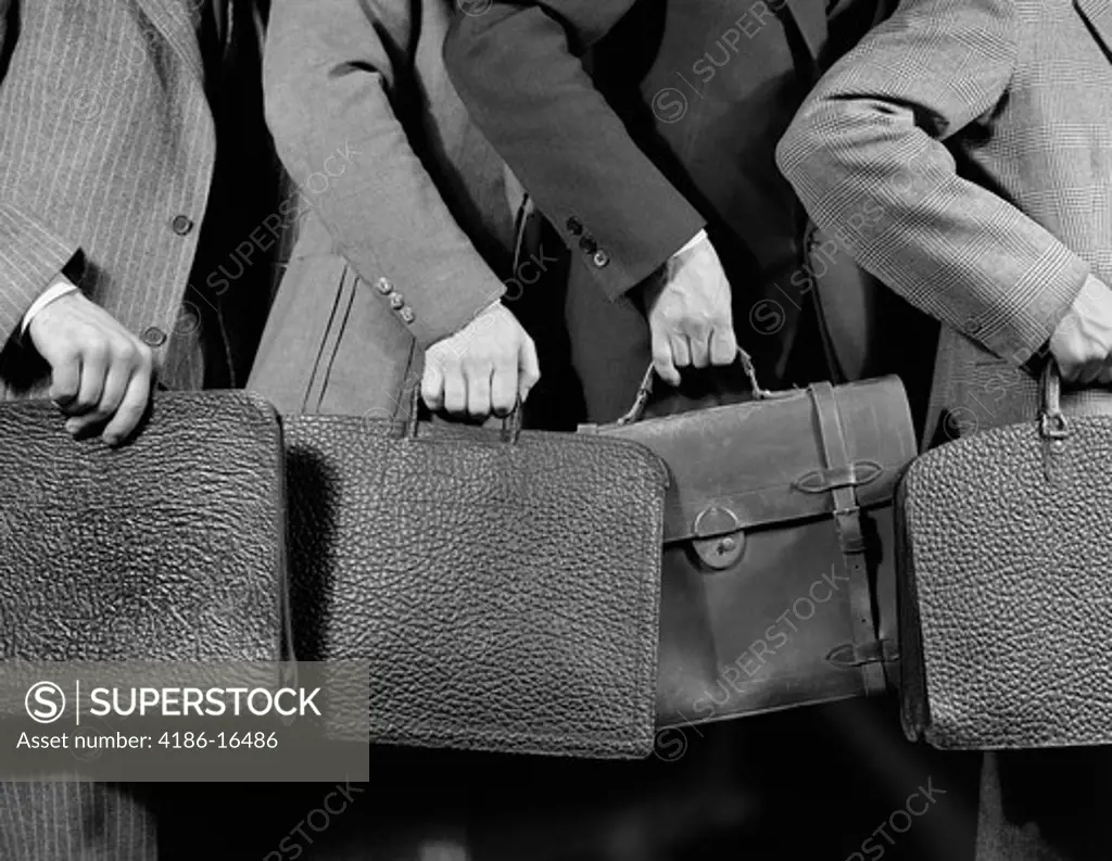 1940S 1950S Rushing Line Of Business Men Holding Briefcases