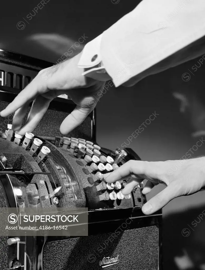 1930S Man'S Hands Pushing Buttons On Cash Register