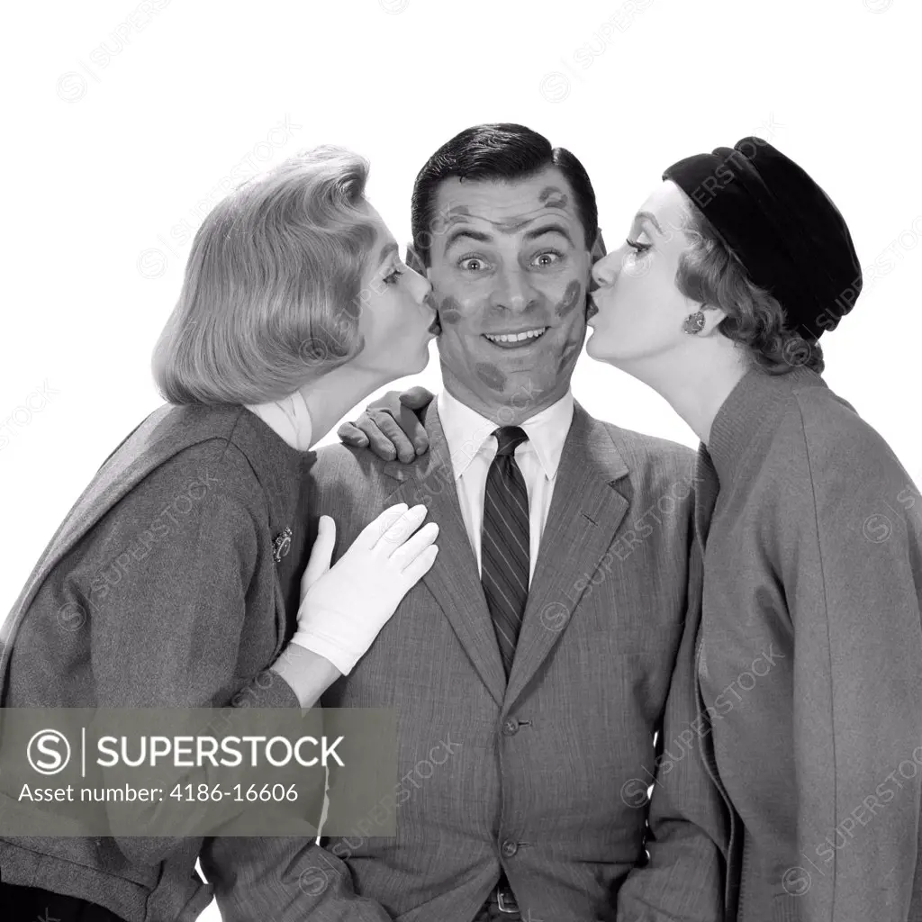 1950S Man Smiling Face Covered With Lipstick Lip Kiss Marks After Being Kissed By Two Women From Both Sides