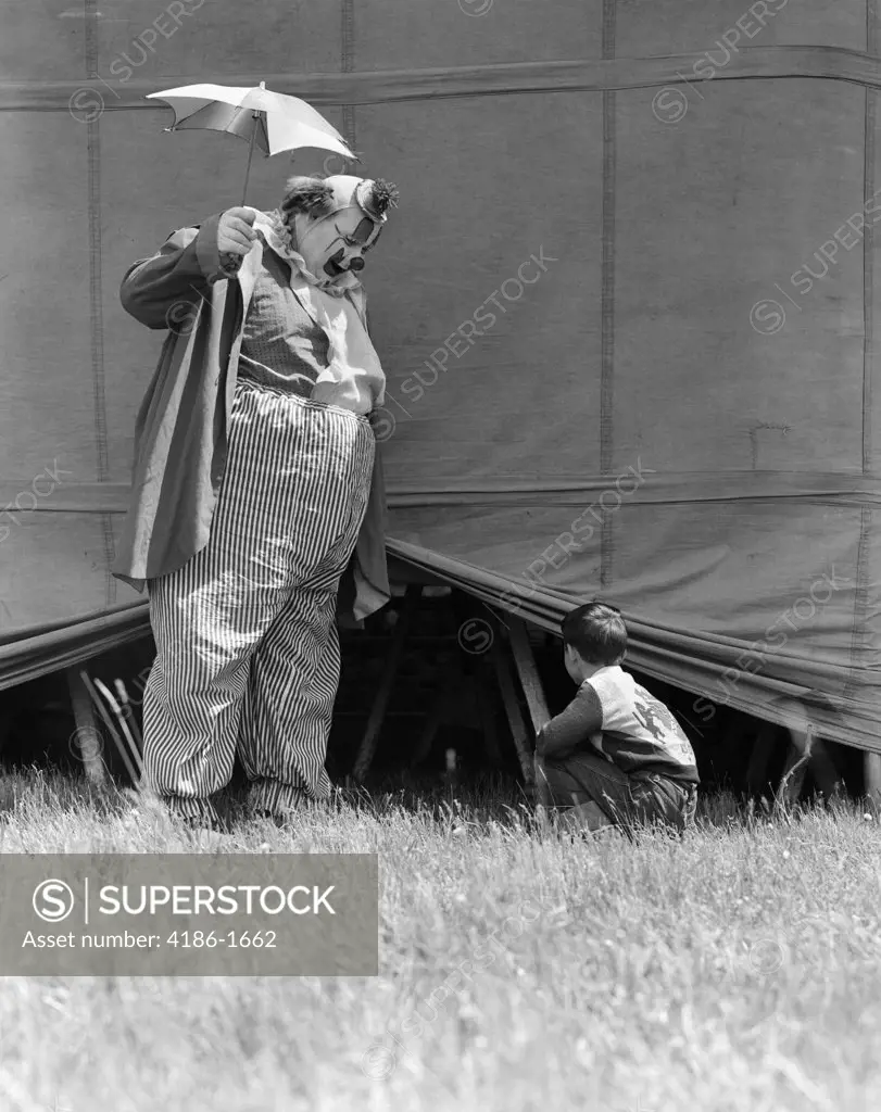 1930S Man Clown Catching Little Boy Peeking Under Circus Big Top Tent