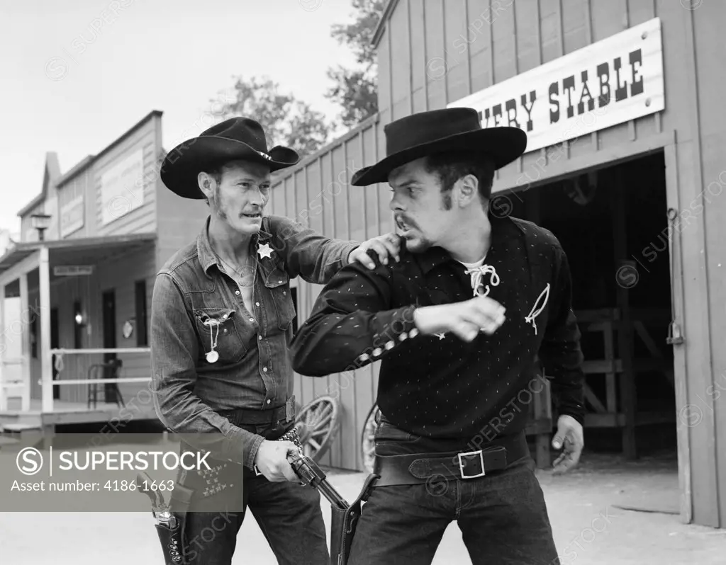 1950S 1960S Cowboy Sheriff Marshall Nabs Arrest Gunfighter Outlaw Near Livery Stable