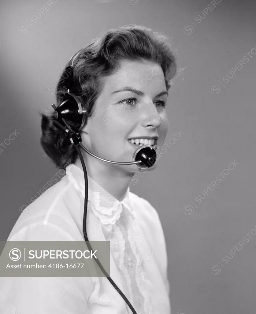 1950S Portrait Woman Telephone Operator Smiling Wearing Headset Indoor