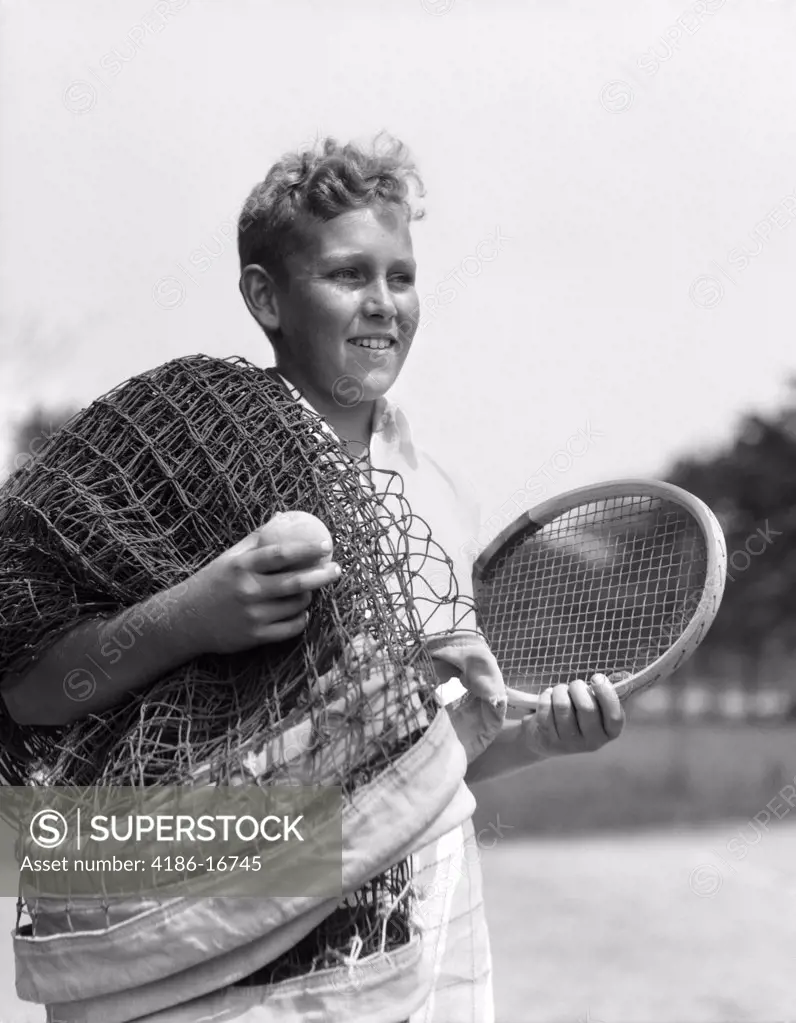 1920S 1930S Boy Tennis Player Holding Racket Net And Ball