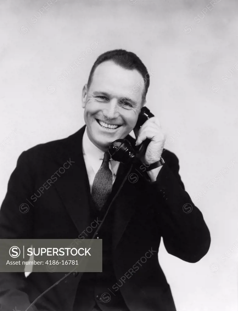 1930S Man Talking On Telephone
