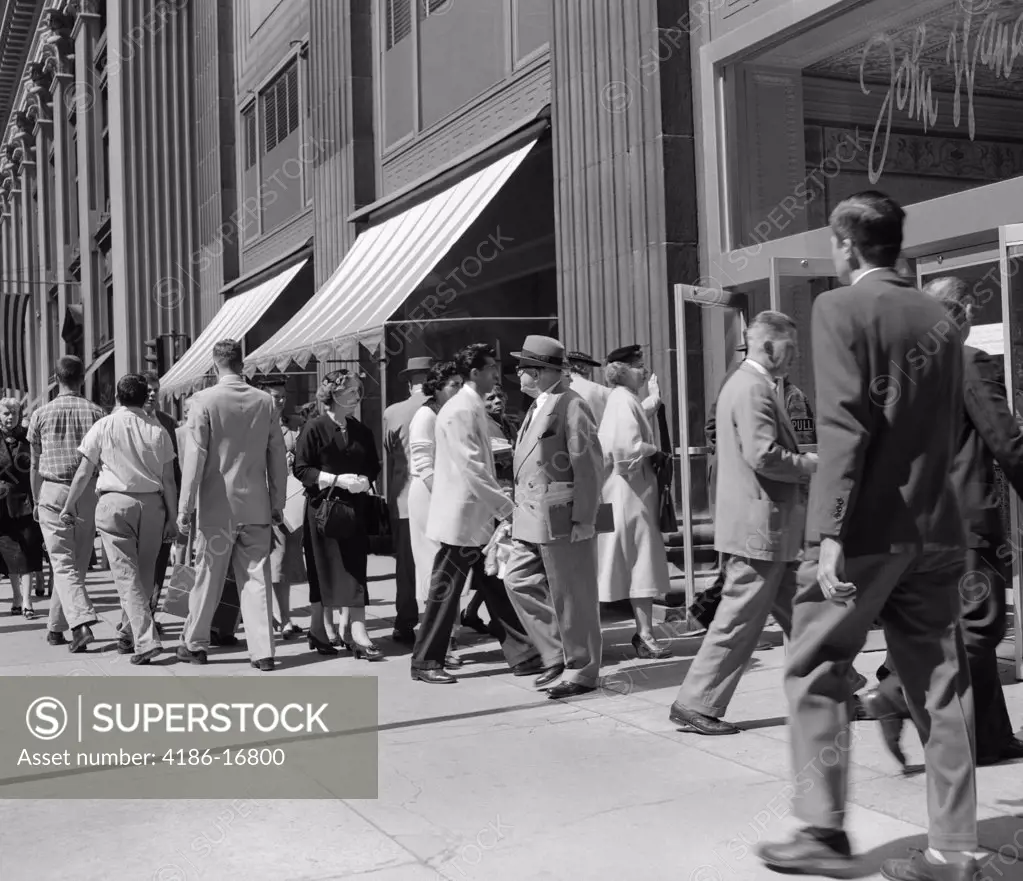 1950S Busy Sidewalk With People Walking In & Out Of John Wanamaker Building In Philadelphia