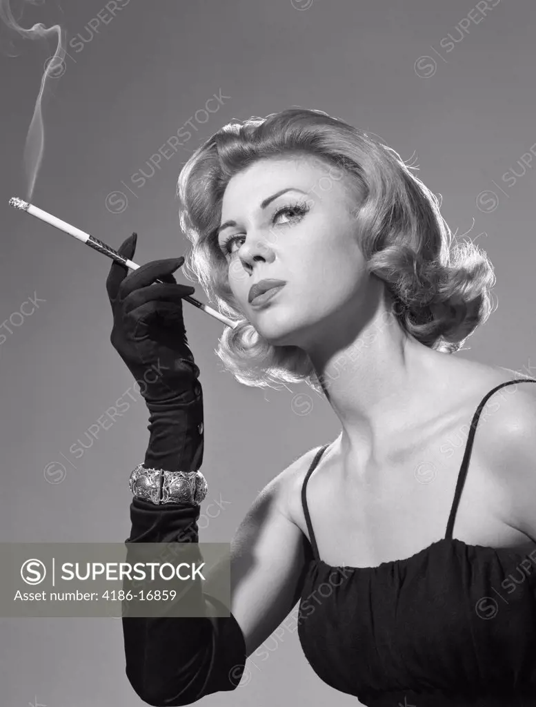1960S Sexy Sultry Woman In Black Dress Long Black Gloves Bracelet Smoking Cigarette In Long Cigarette Holder