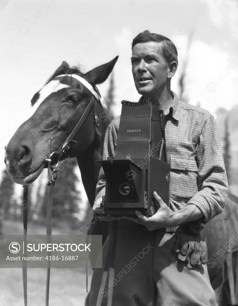 1920S Outdoor Photographer With Graflex Camera Standing Beside Horse