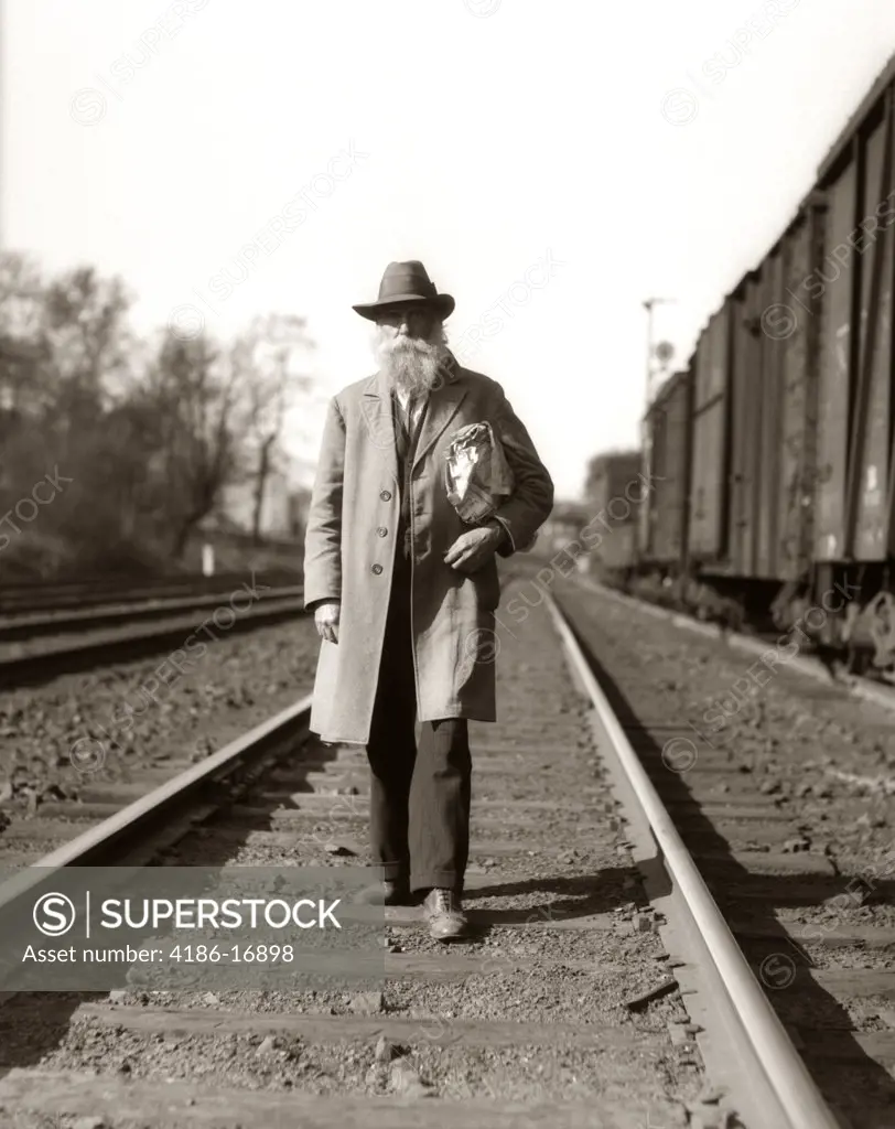 1930S Great Depression Era Man Homeless Hobo Walking Down Railroad Tracks