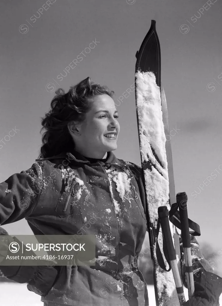 1940S Smiling Woman Portrait Holding Skis And Ski Poles Winter Outdoor