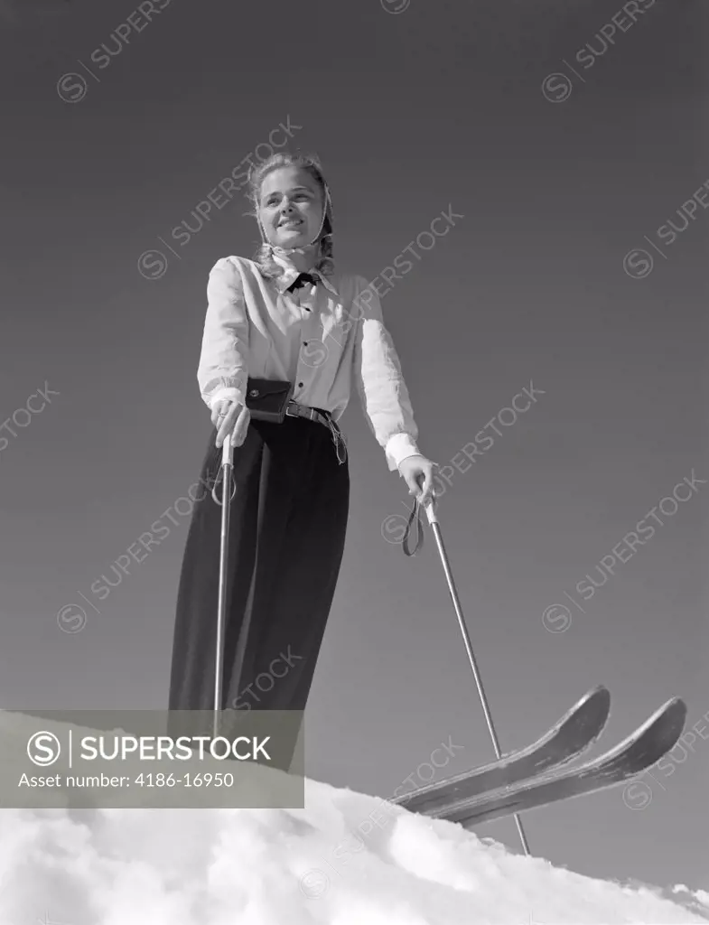 1940S Smiling Blond Woman Skier Poised On Hill Top To Begin Downhill Skiing Winter Outdoor