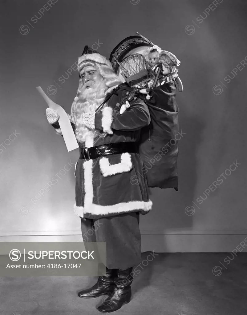 1940S Santa Claus Carrying Bag Full Of Toys Reading List