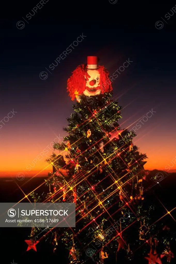 Decorated Christmas Tree With Clown On Top