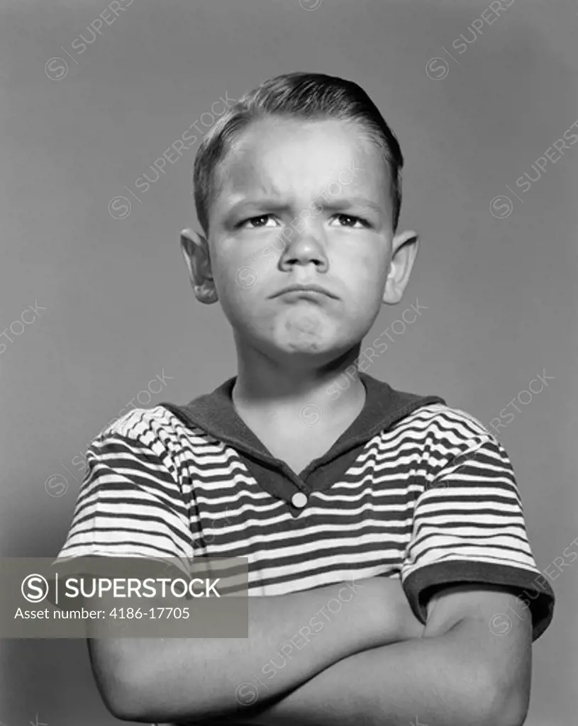 1960S Portrait Pouting Angry Boy Arms Folded Against Chest Striped Shirt