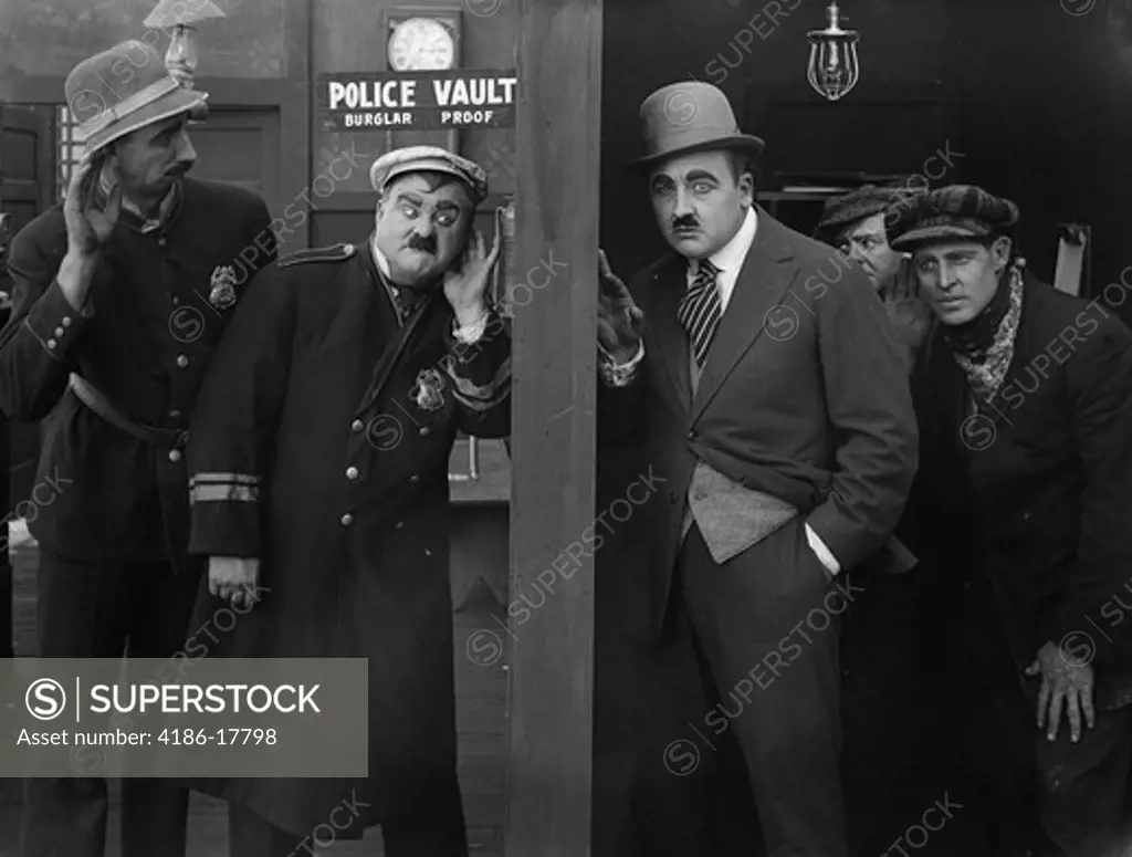 1910s 1920s COMIC COPS AND ROBBERS ON EITHER SIDE OF BURGLAR PROOF POLICE VAULT