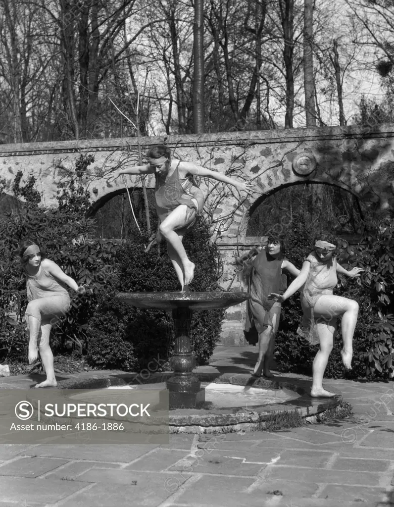 1920S Sprites Dancing In Fountain