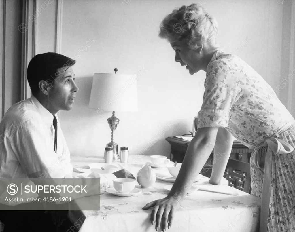 1960S Husband And Wife Arguing At Breakfast Table Indoor