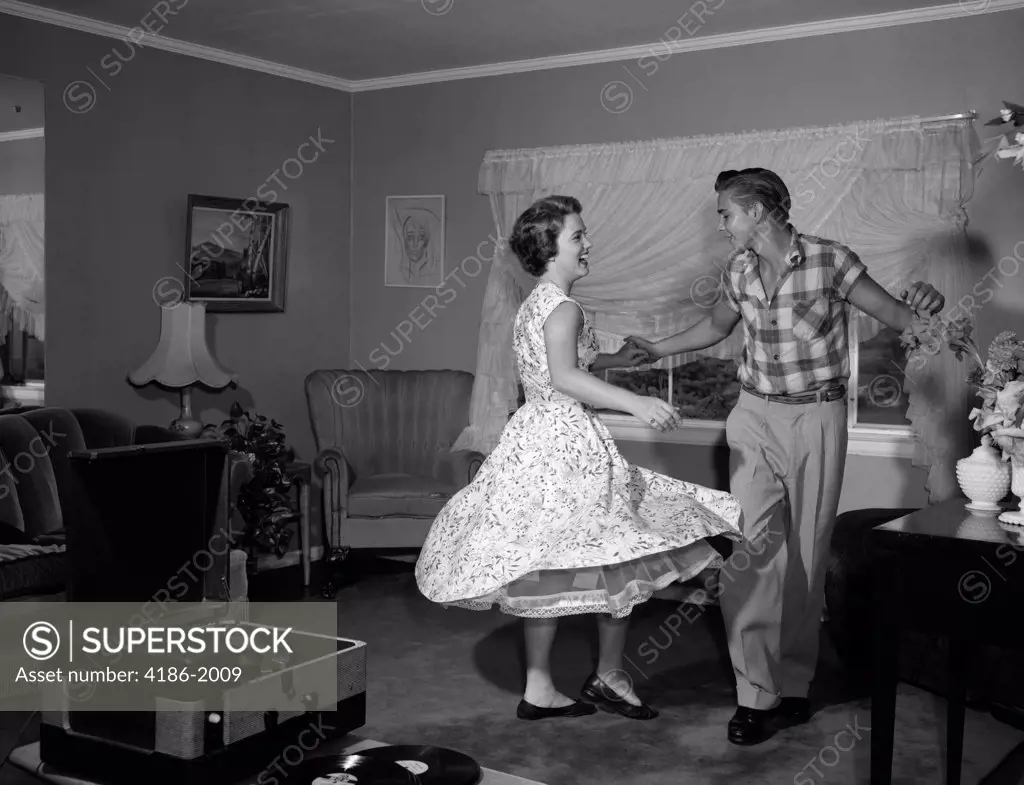 1950S-60S Teen Couple Dancing Jitterbug In Living Room
