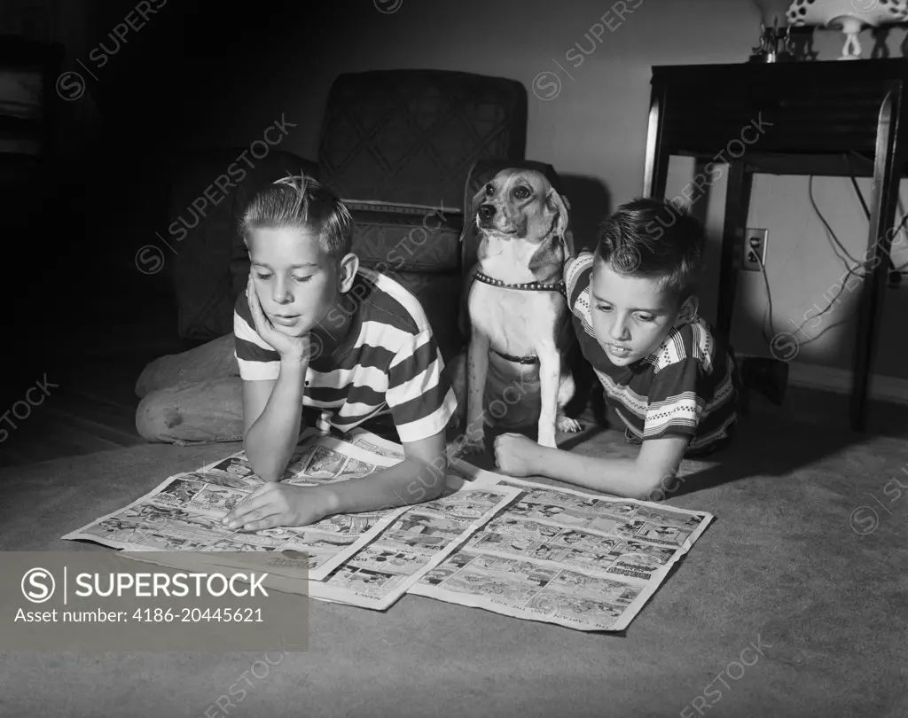 1950s TWO BOYS READING SUNDAY COMICS LIVING ROOM FLOOR DOG INDOOR FUNNY PAPERS NEWSPAPERS