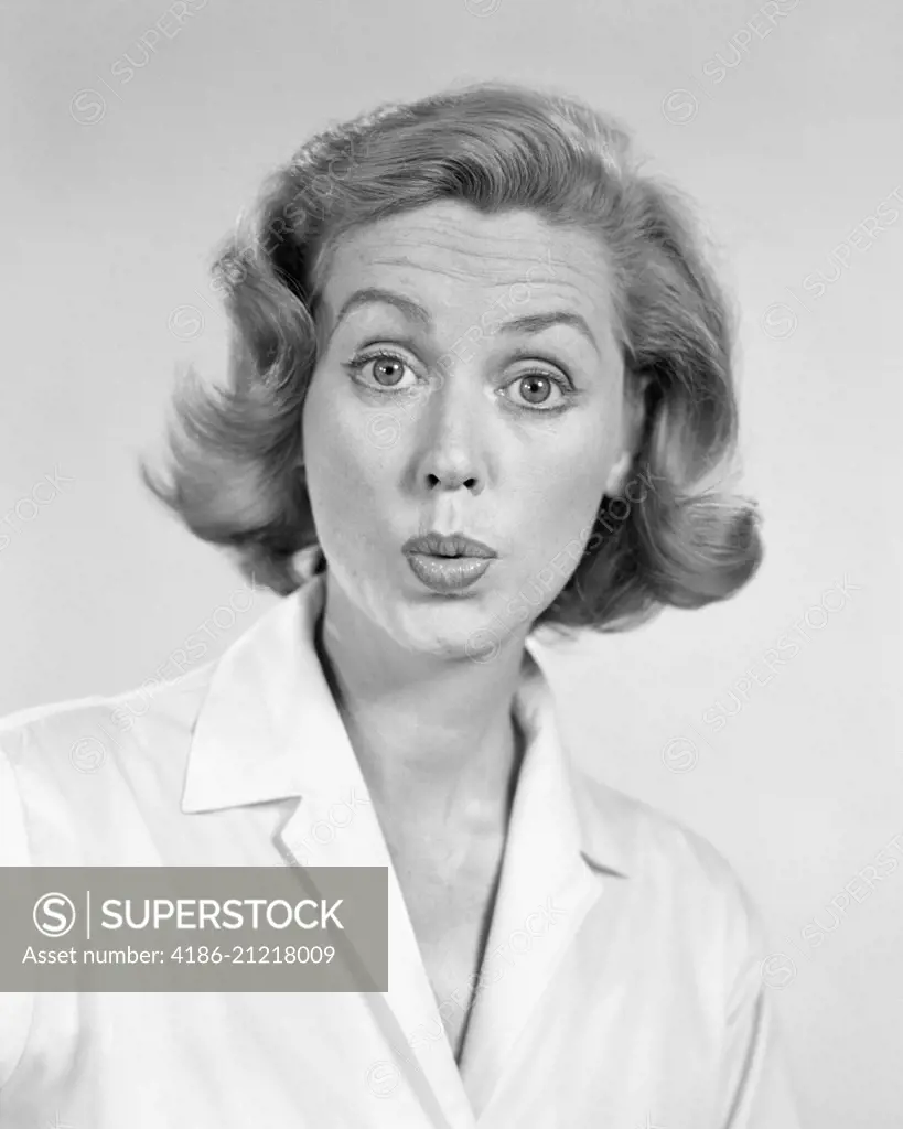 1950s 1960s PORTRAIT WOMAN WITH SHOCKED SURPRISED FACIAL EXPRESSION