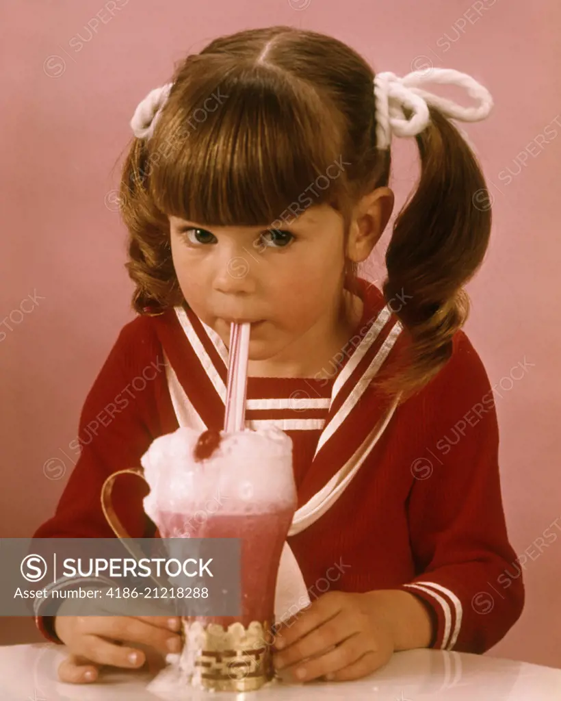 1960s 1970s BRUNETTE GIRL RED BLOUSE DRINKING PINK STRAWBERRY DRINK MILKSHAKE ICE CREAM SODA