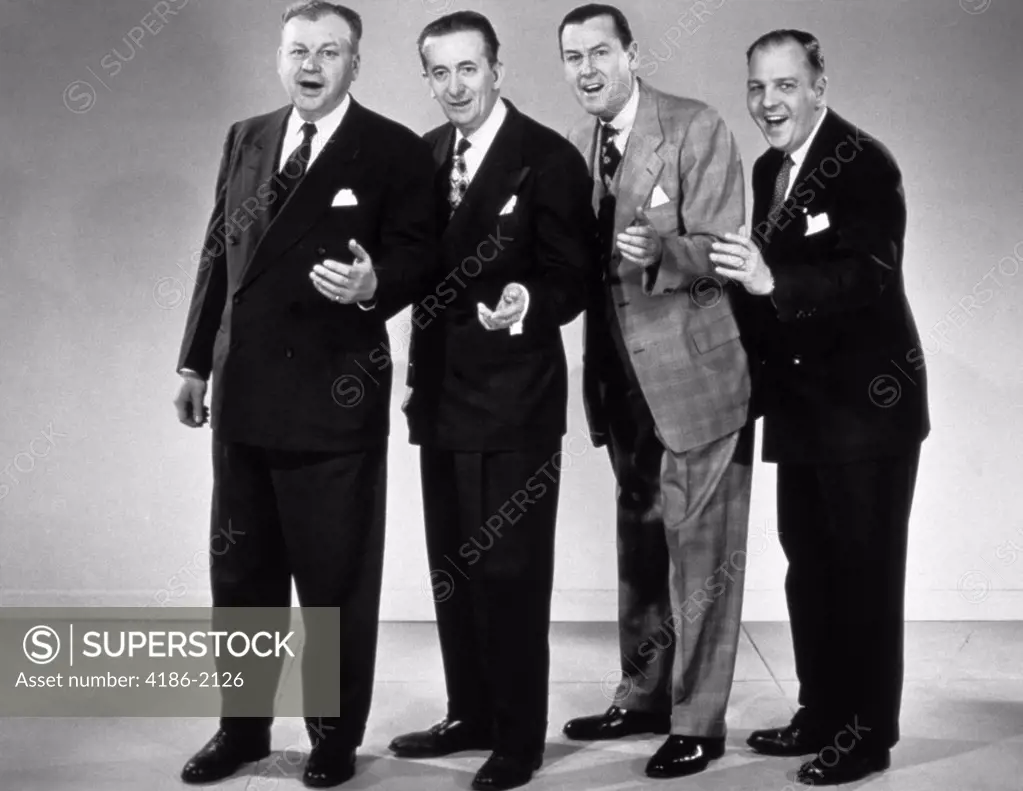 1950S Musical Quartet Of Business Men Singing Looking At Camera