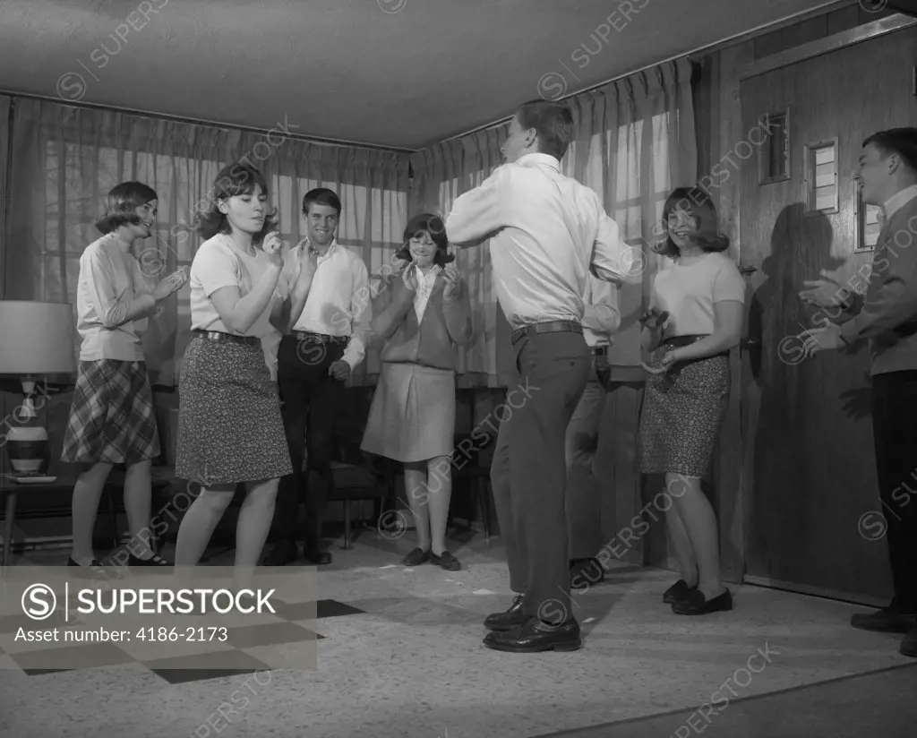 1960S Group Of Young Teenagers Dancing Inside