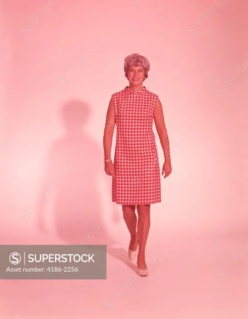 1960S Woman Full Length Portrait Walking Towards Camera