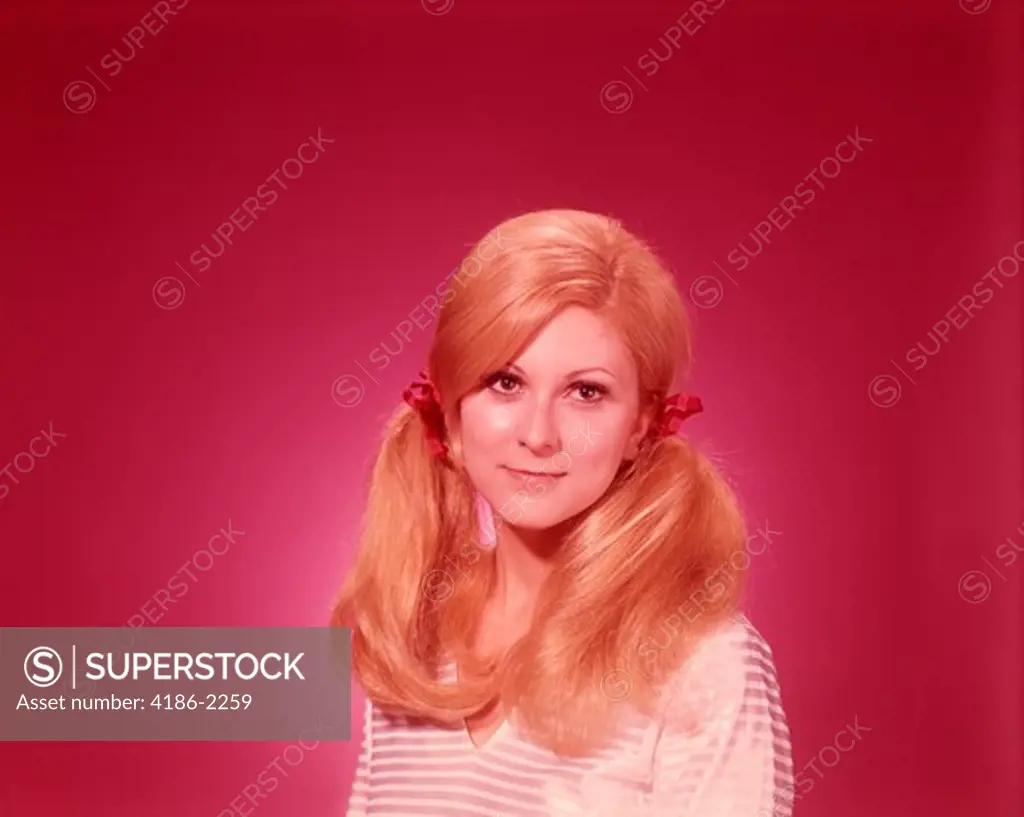 1960S Head And Shoulders Portrait Woman Hair In Pony Tails