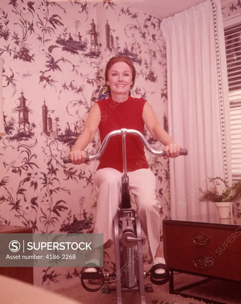 1960S Woman On Exercise Cycle