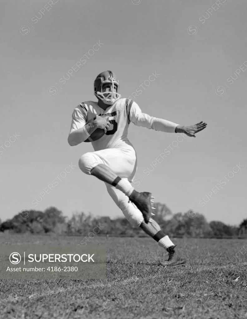 1960S Young Man Football Player Running With Ball